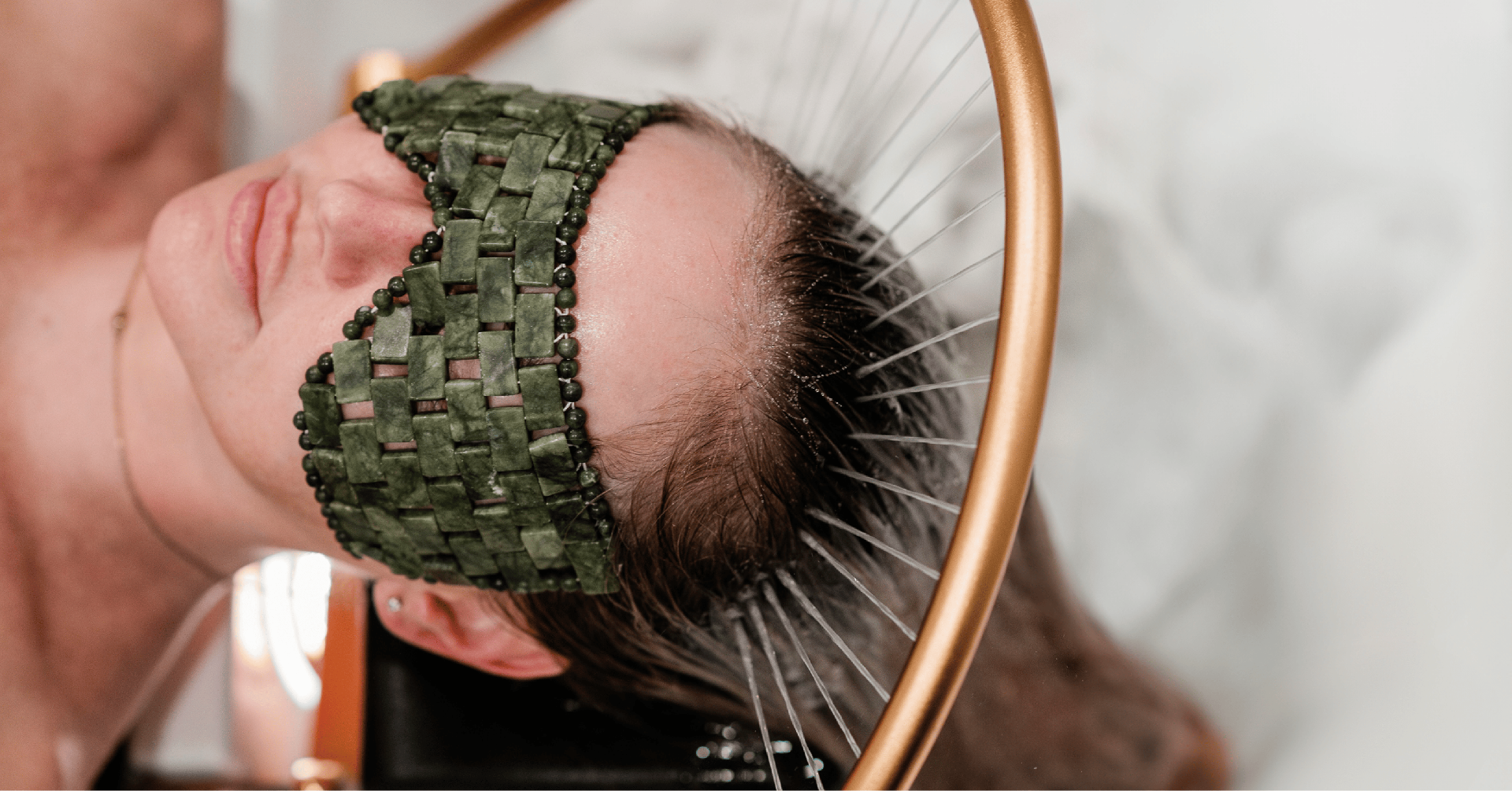 Japanese head spa ritual setup with rose petal water bowl, scalp oil and wooden comb at our London clinic